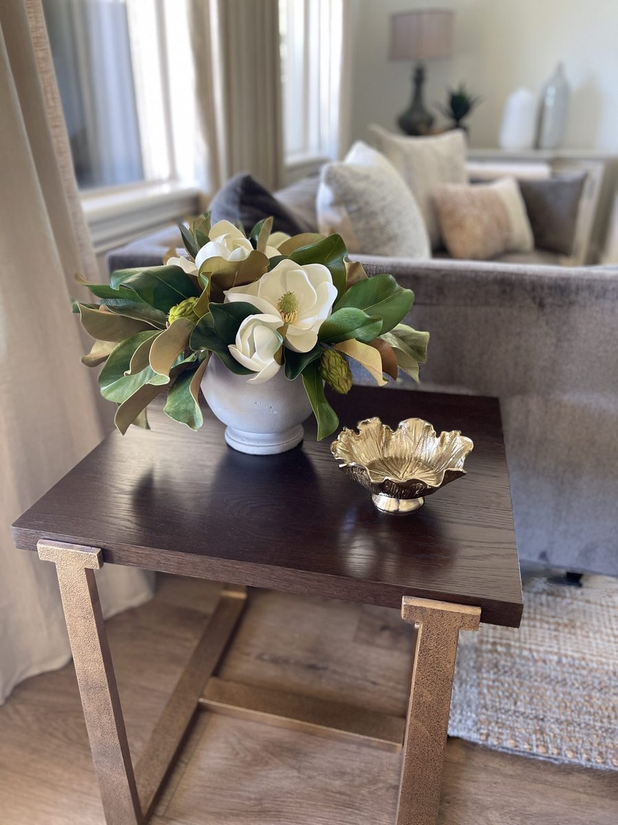 Styled side table with fresh flowers